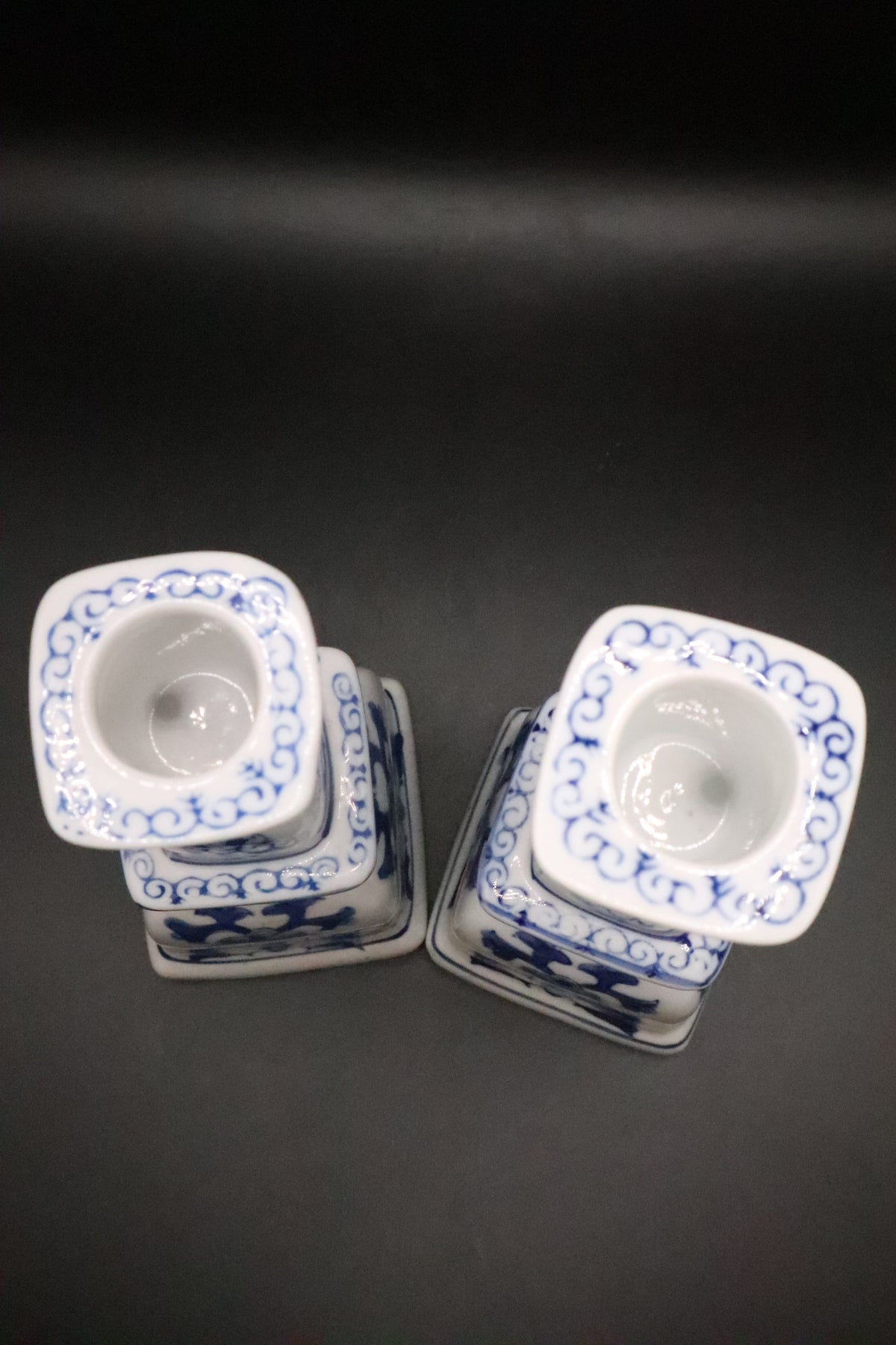 VINTAGE CHINOISERIE BLUE AND WHITE CANDLE HOLDERS (PAIR)