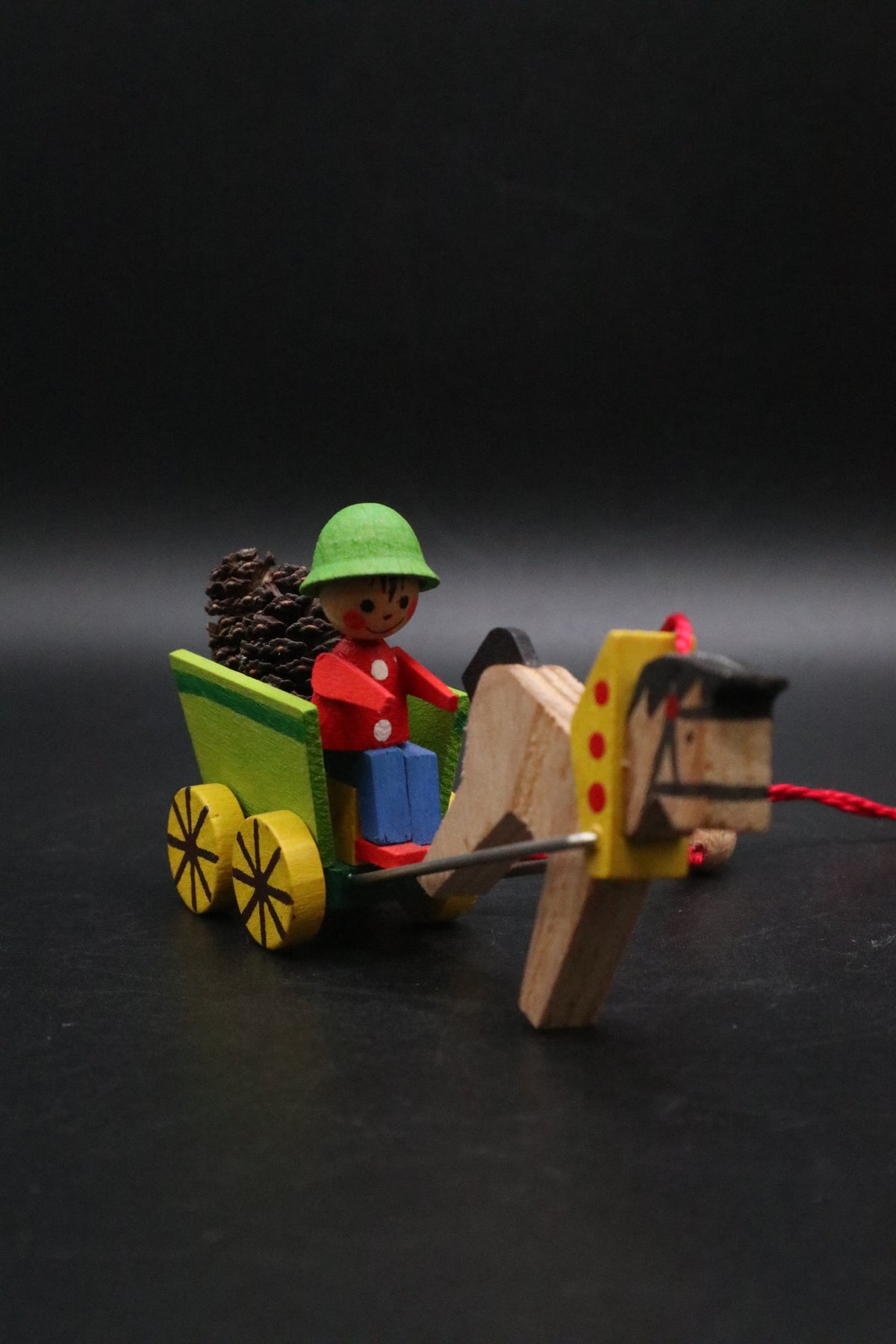 VINTAGE GERMAN STEINBACH VOLKSKUNST WOODEN WAGON BOY WITH PINE CONES AND HORSE