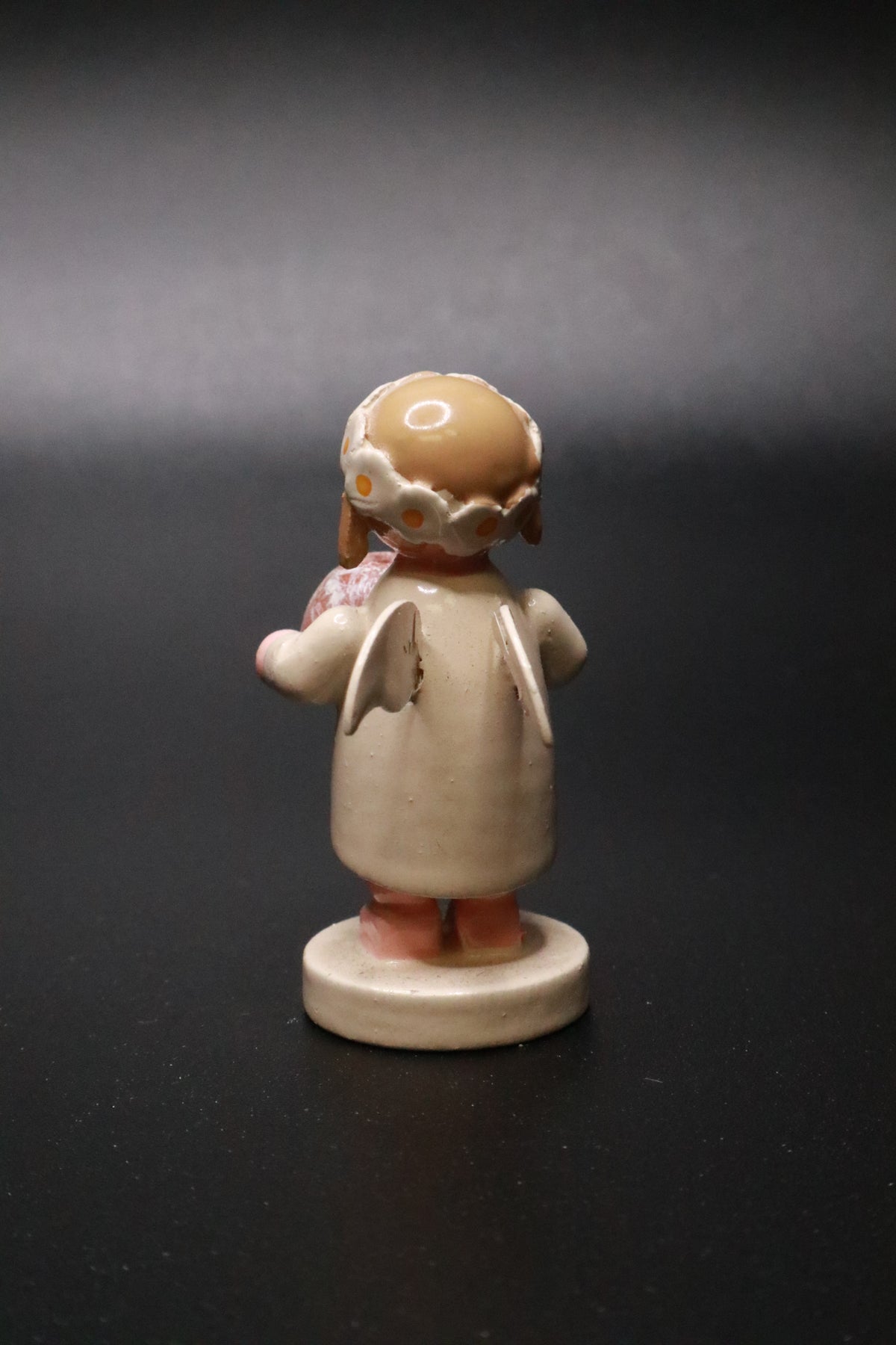 WENDT AND KüHN GERMAN "MARGUERITE ANGEL" FIGURINE "HOLDING A BUNT CAKE"
