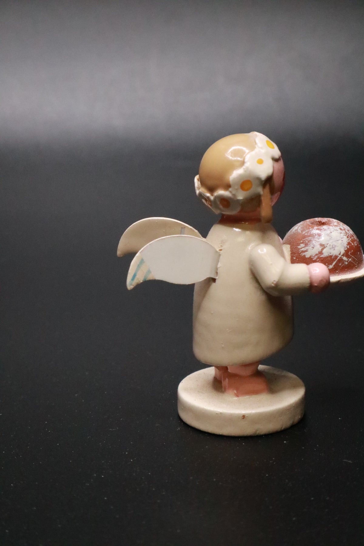 WENDT AND KüHN GERMAN "MARGUERITE ANGEL" FIGURINE "HOLDING A BUNT CAKE"