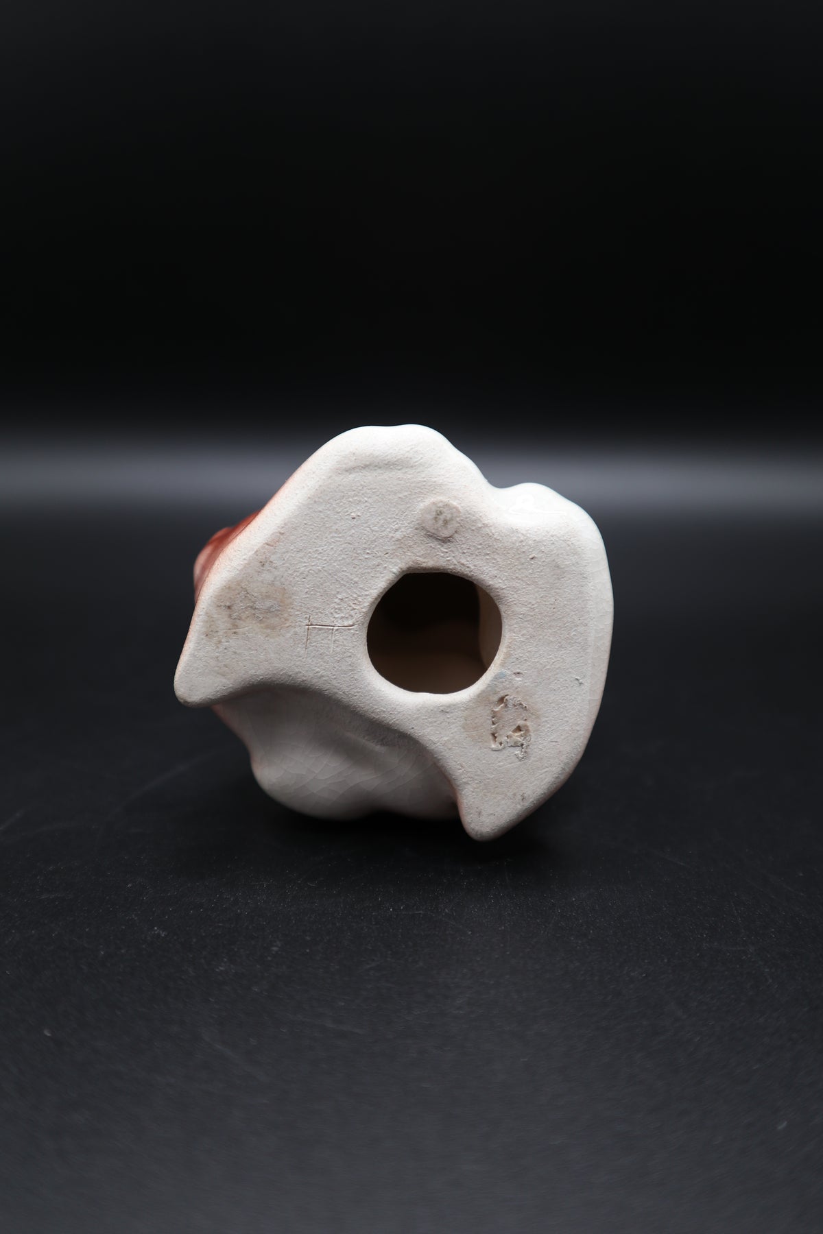 SMALL CERAMIC DOG WITH FLOWERS AND GOLD BOW