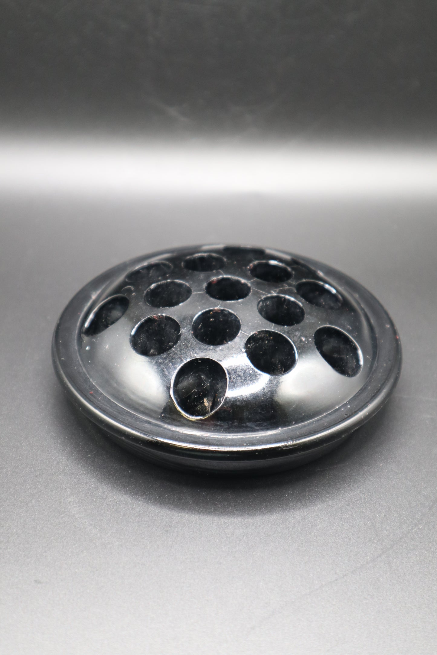 VINTAGE BLACK GLASS FLOWER FROG