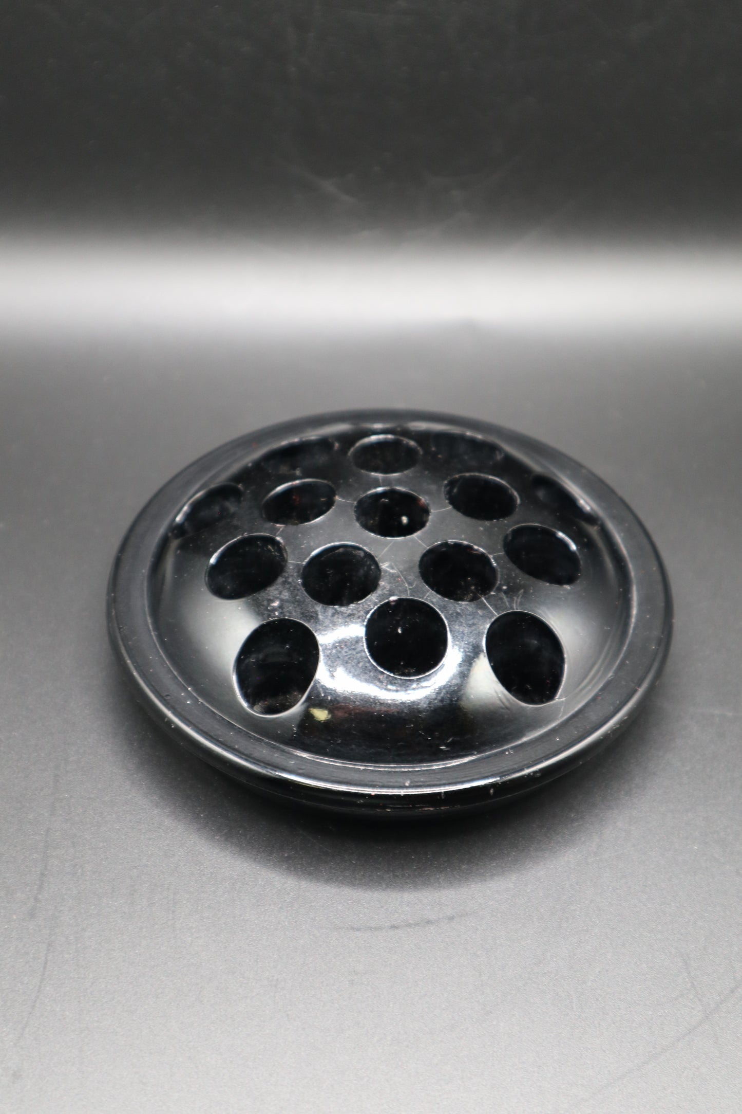 VINTAGE BLACK GLASS FLOWER FROG