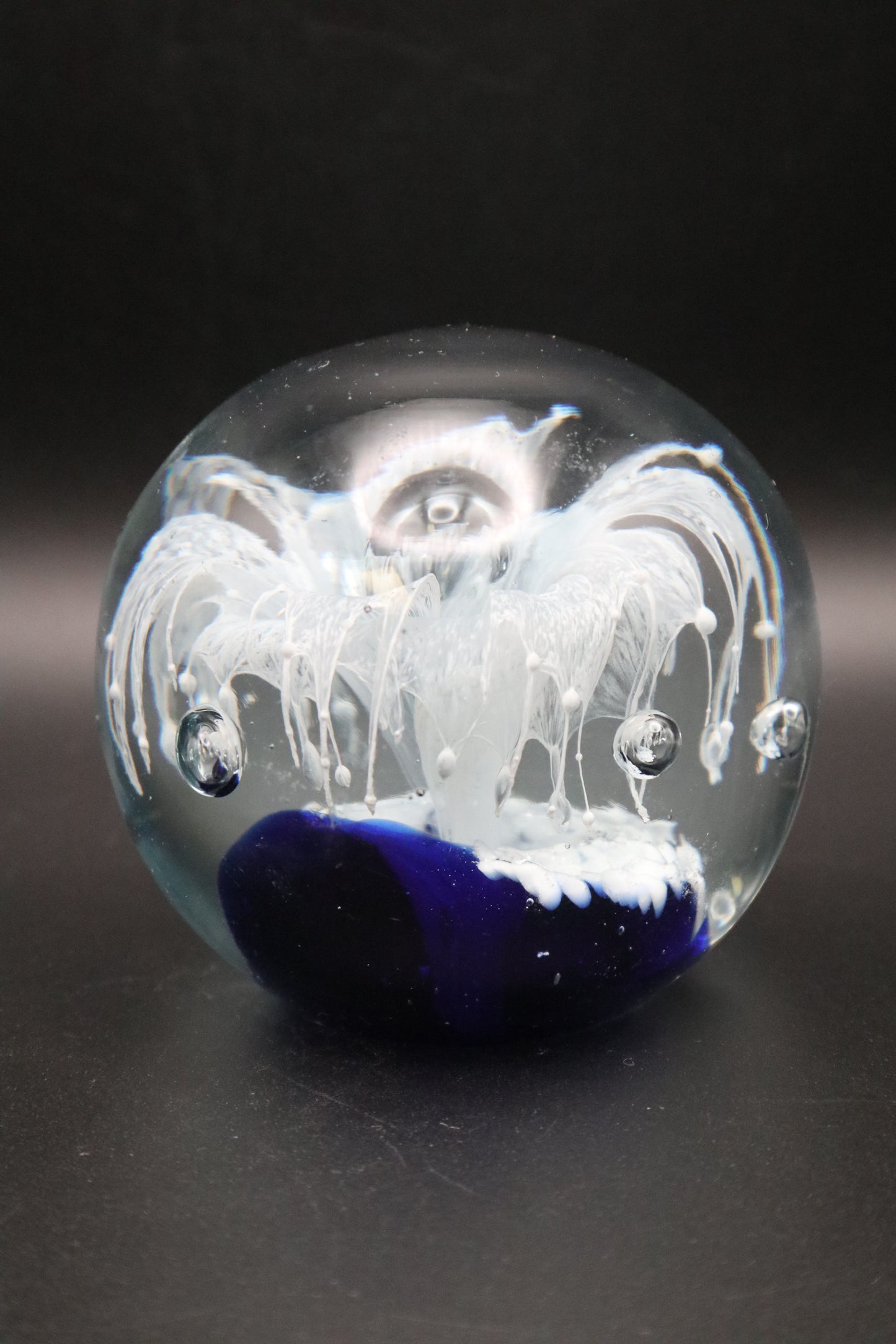 VINTAGE ART GLASS COBALT BLUE WITH WHITE FLOWER PAPERWEIGHT