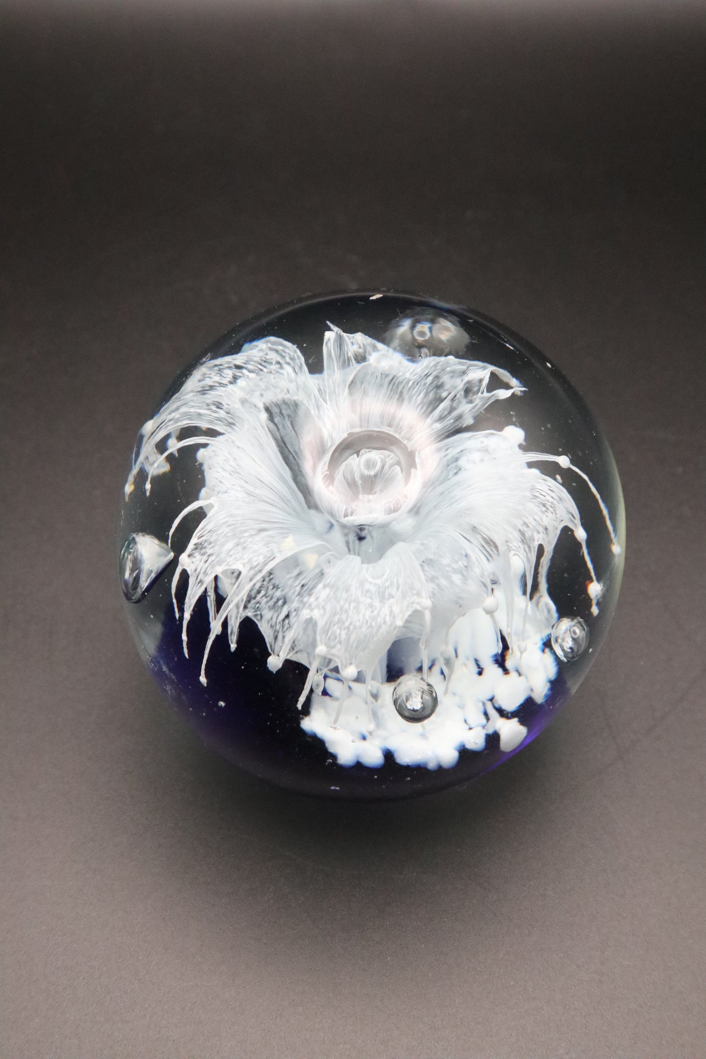VINTAGE ART GLASS COBALT BLUE WITH WHITE FLOWER PAPERWEIGHT