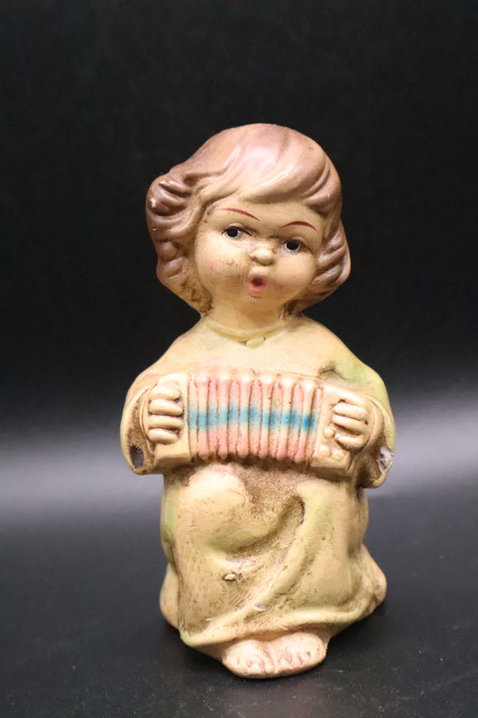 1960's VINTAGE GREEN TINT GIRL ANGEL WITH ACCORDION CHALKWARE FIGURINE