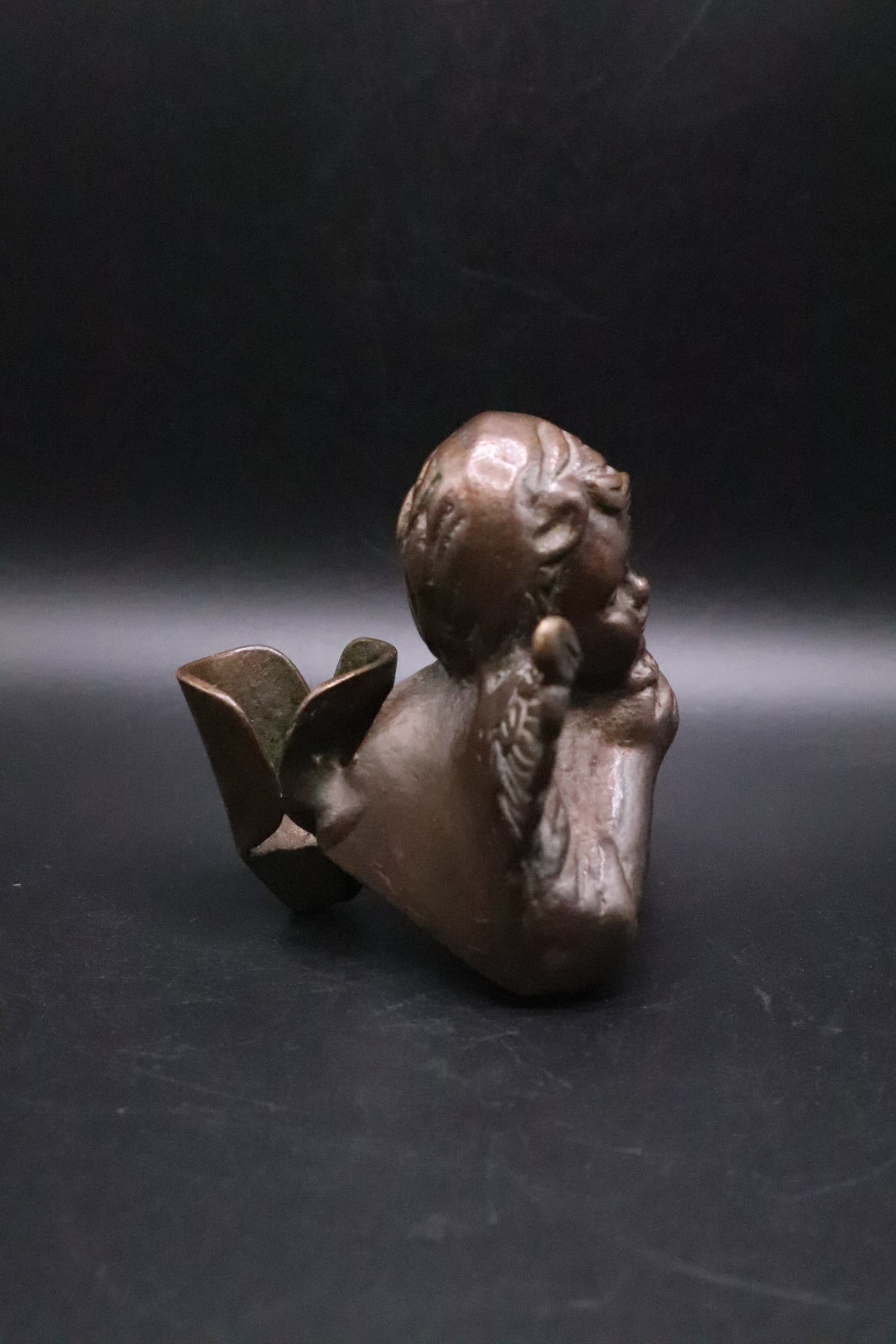 BRASS CHERUB CANDLE HOLDER