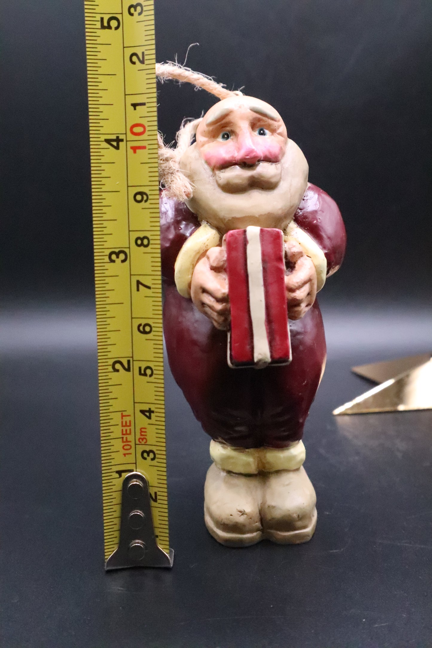 CHRISTMAS SANTA HOLDING GIFT ORNAMENT
