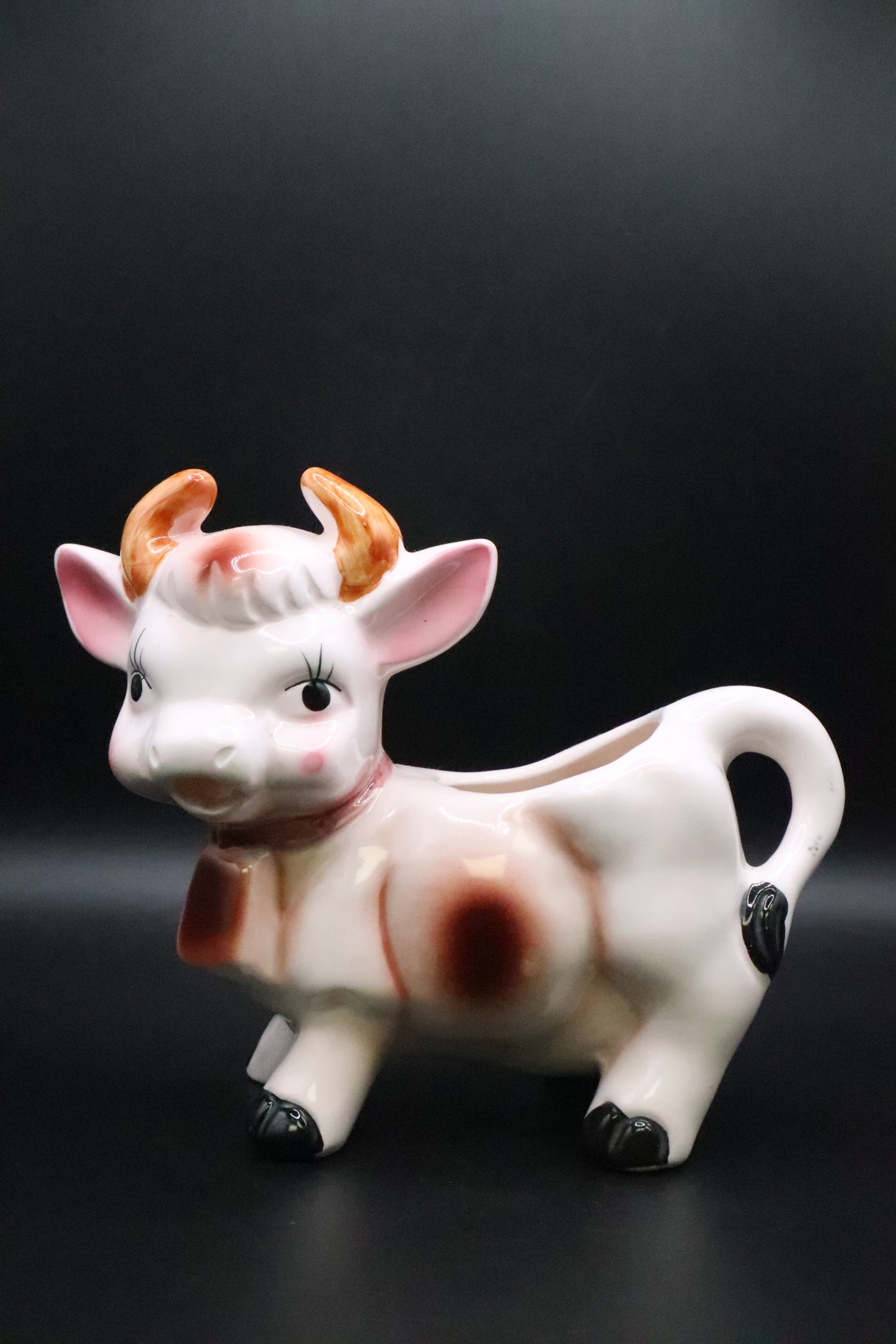 VINTAGE CERAMIC COW CREAMER BROWN AND WHITE