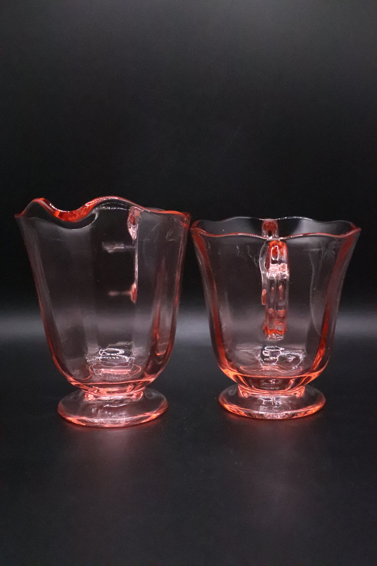 FOSTORIA CLEAR PINK GLASS FOOTED OPEN SUGAR BOWL AND CREAMER (PAIR)