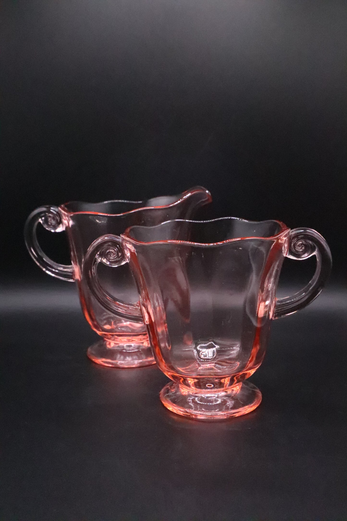 FOSTORIA CLEAR PINK GLASS FOOTED OPEN SUGAR BOWL AND CREAMER (PAIR)