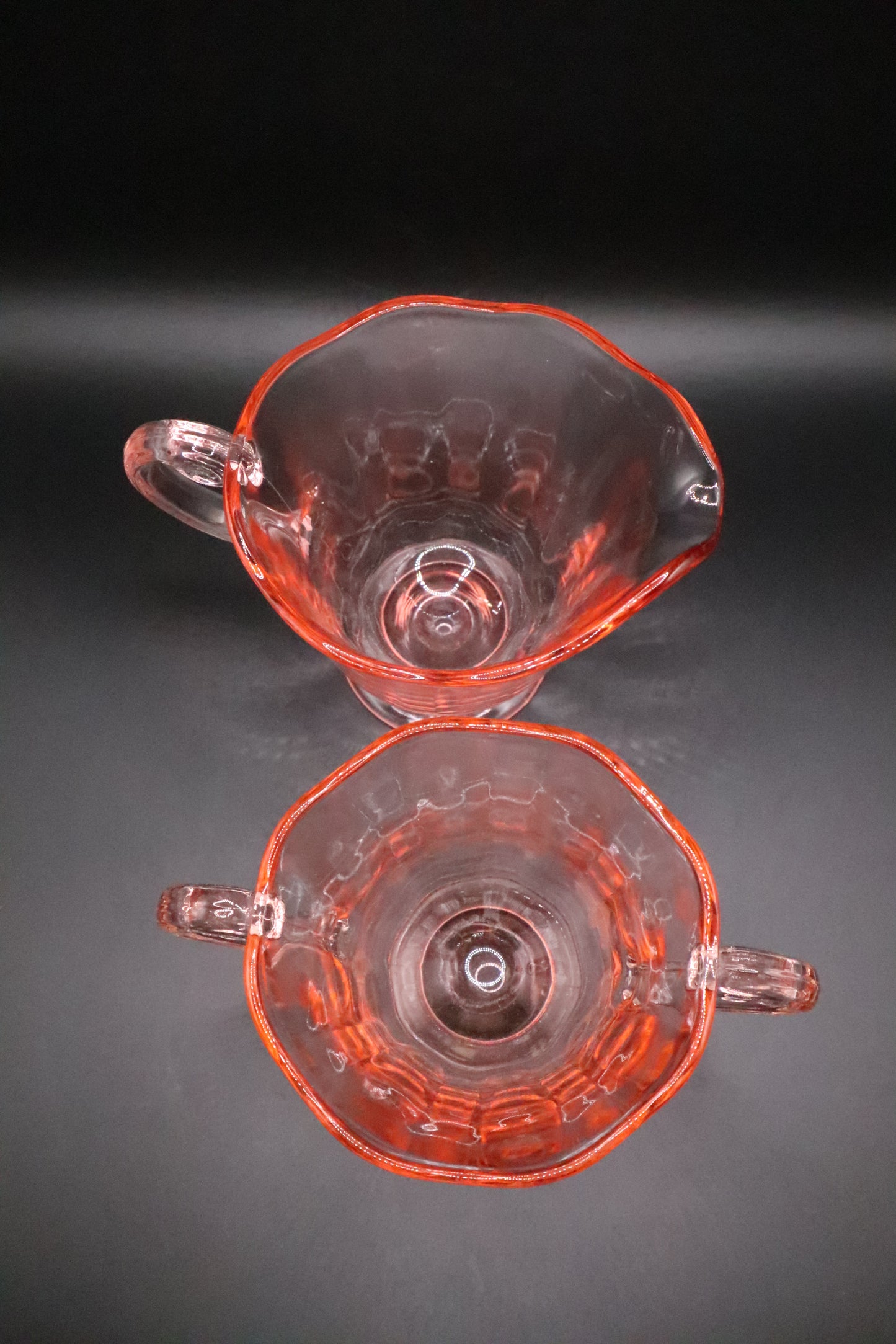 FOSTORIA CLEAR PINK GLASS FOOTED OPEN SUGAR BOWL AND CREAMER (PAIR)