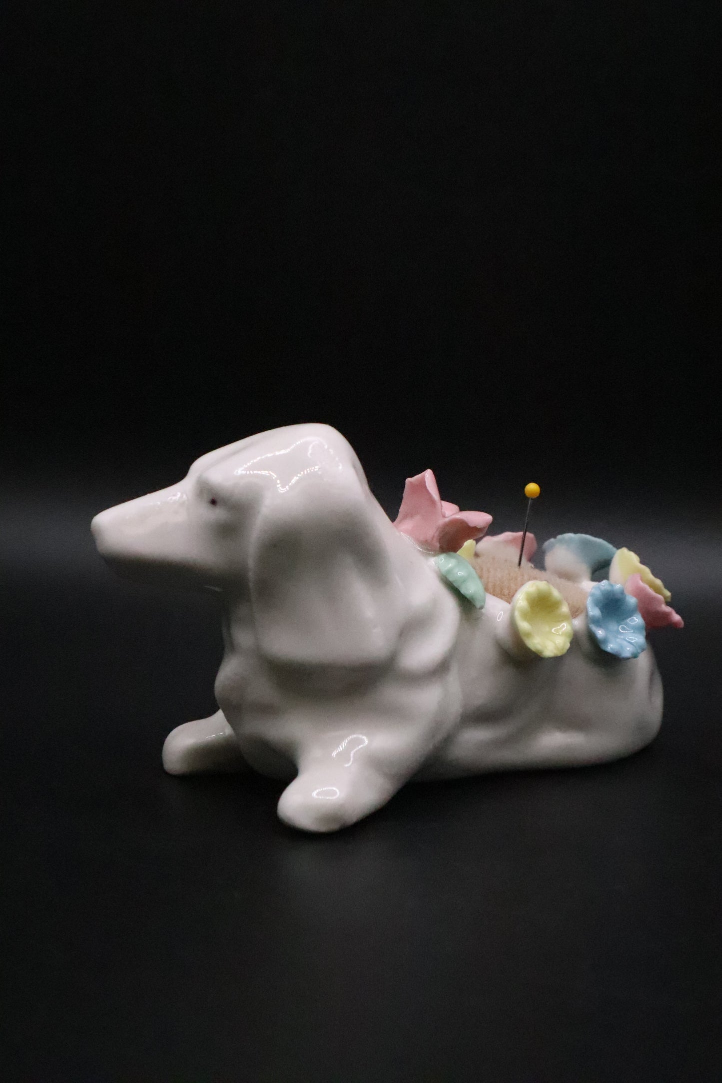 VINTAGE CERAMIC DACHSHUND DOG WITH FLOWERS PIN CUSHION