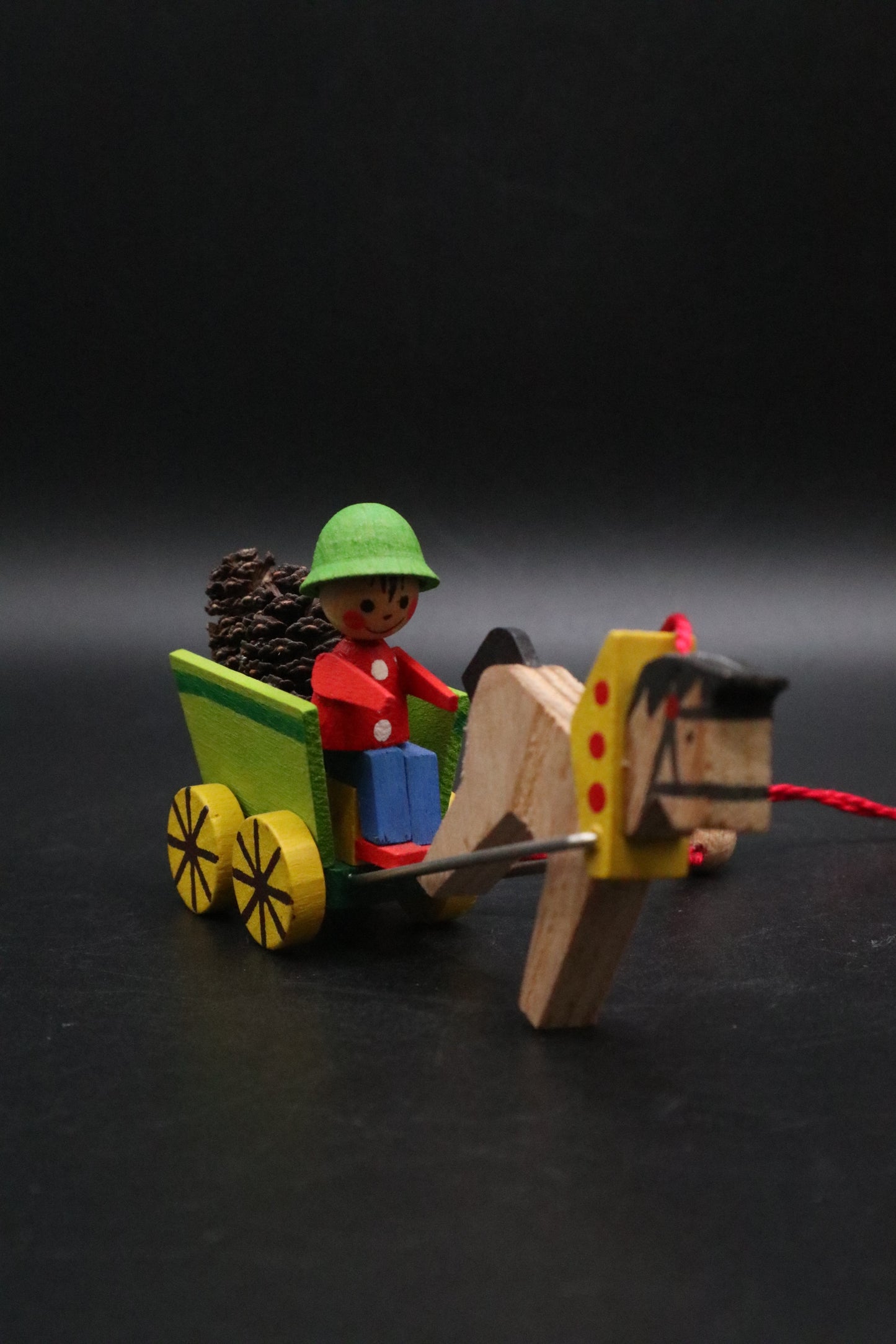 VINTAGE GERMAN STEINBACH VOLKSKUNST WOODEN WAGON BOY WITH PINE CONES AND HORSE