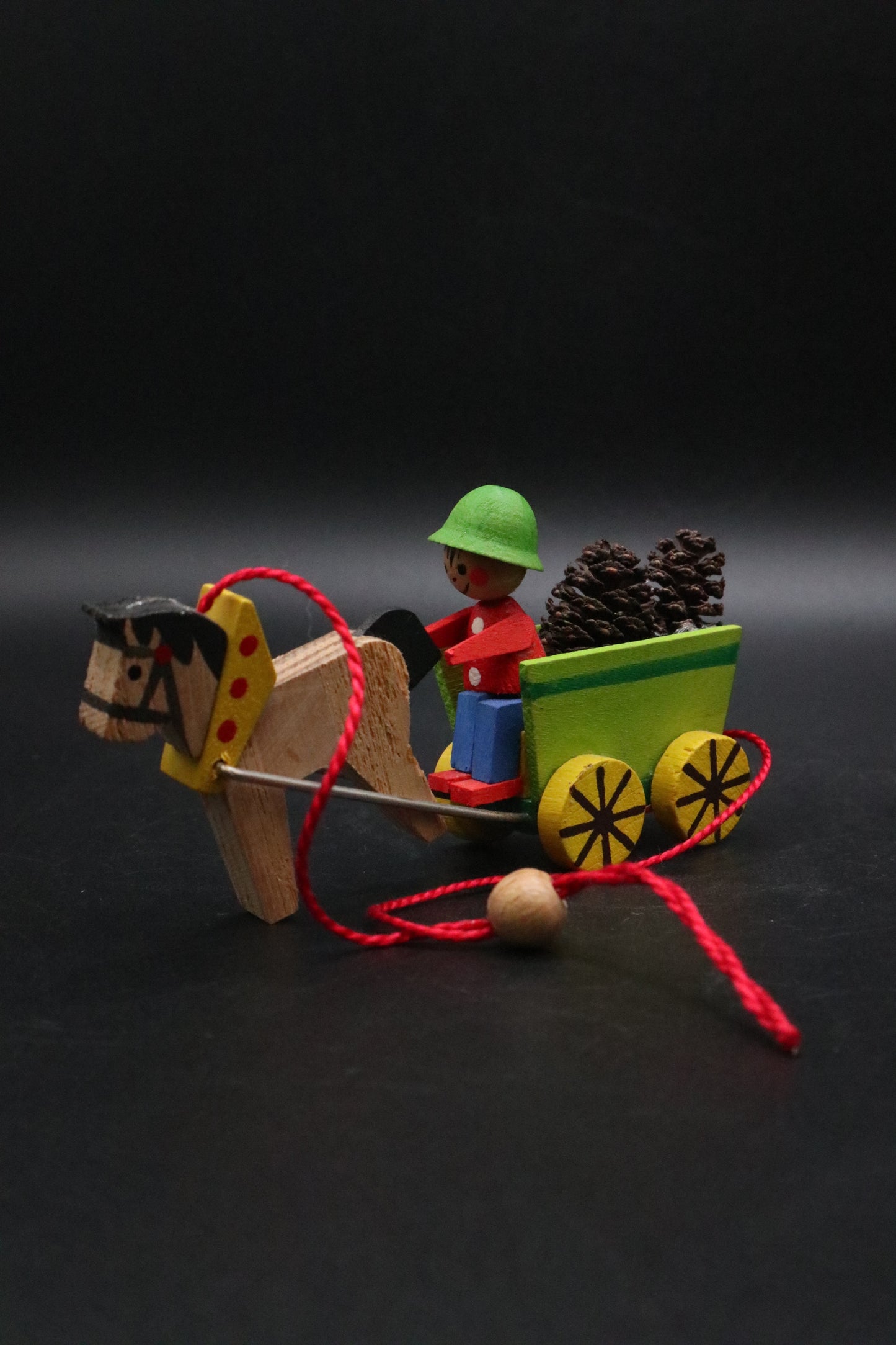 VINTAGE GERMAN STEINBACH VOLKSKUNST WOODEN WAGON BOY WITH PINE CONES AND HORSE