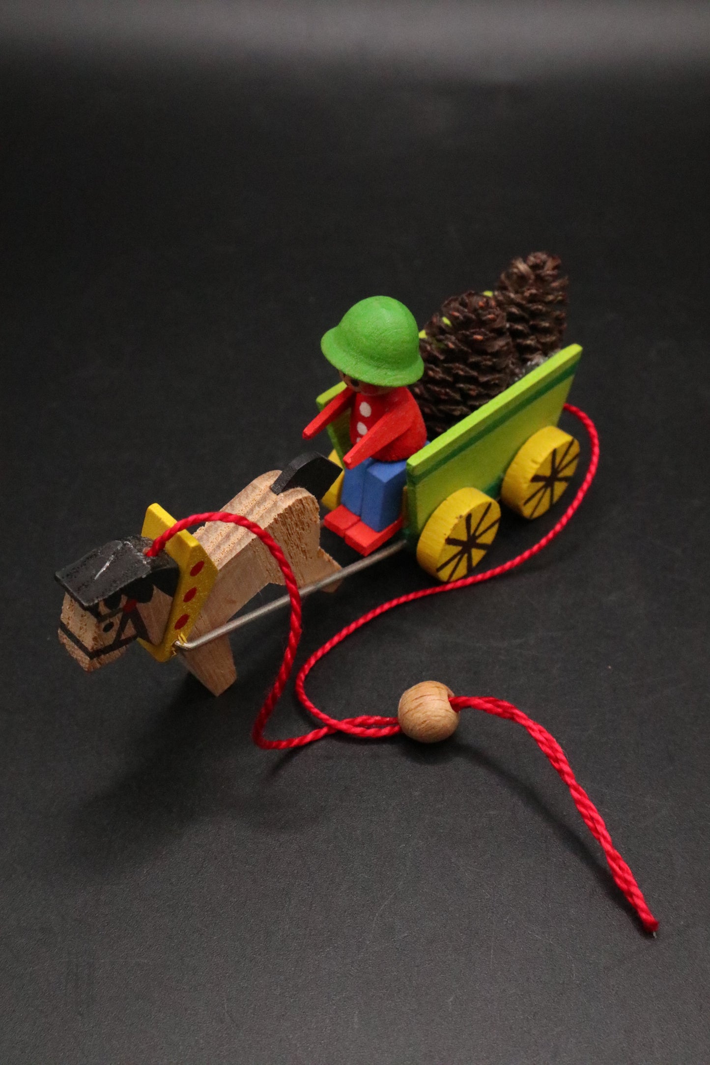 VINTAGE GERMAN STEINBACH VOLKSKUNST WOODEN WAGON BOY WITH PINE CONES AND HORSE