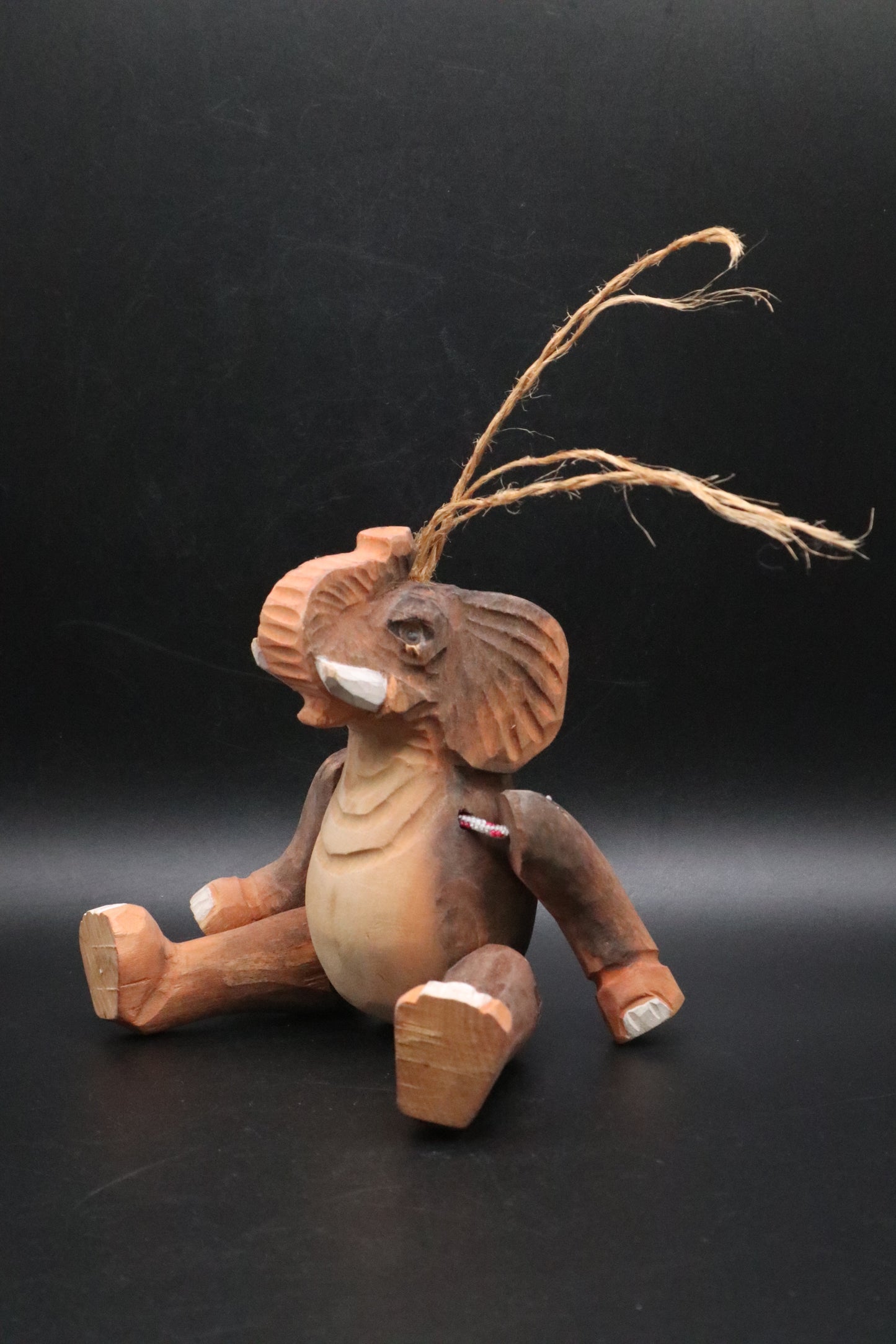 VINTAGE HAND CARVED WOODEN ELEPHANT ORNAMENT
