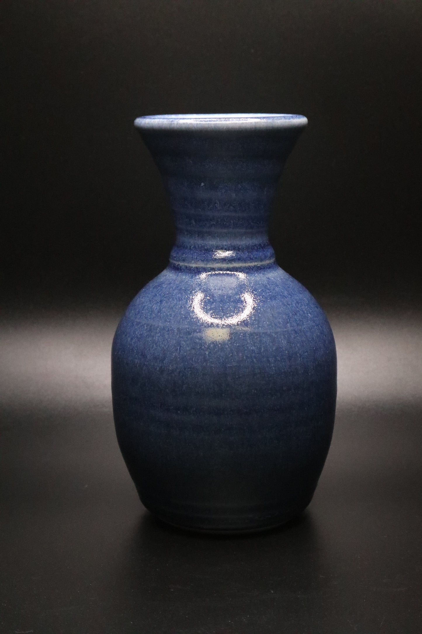 CARL SHEEHAN 1992 POTTERY VASE DEEP BLUE GLAZE WITH WEED DESIGN