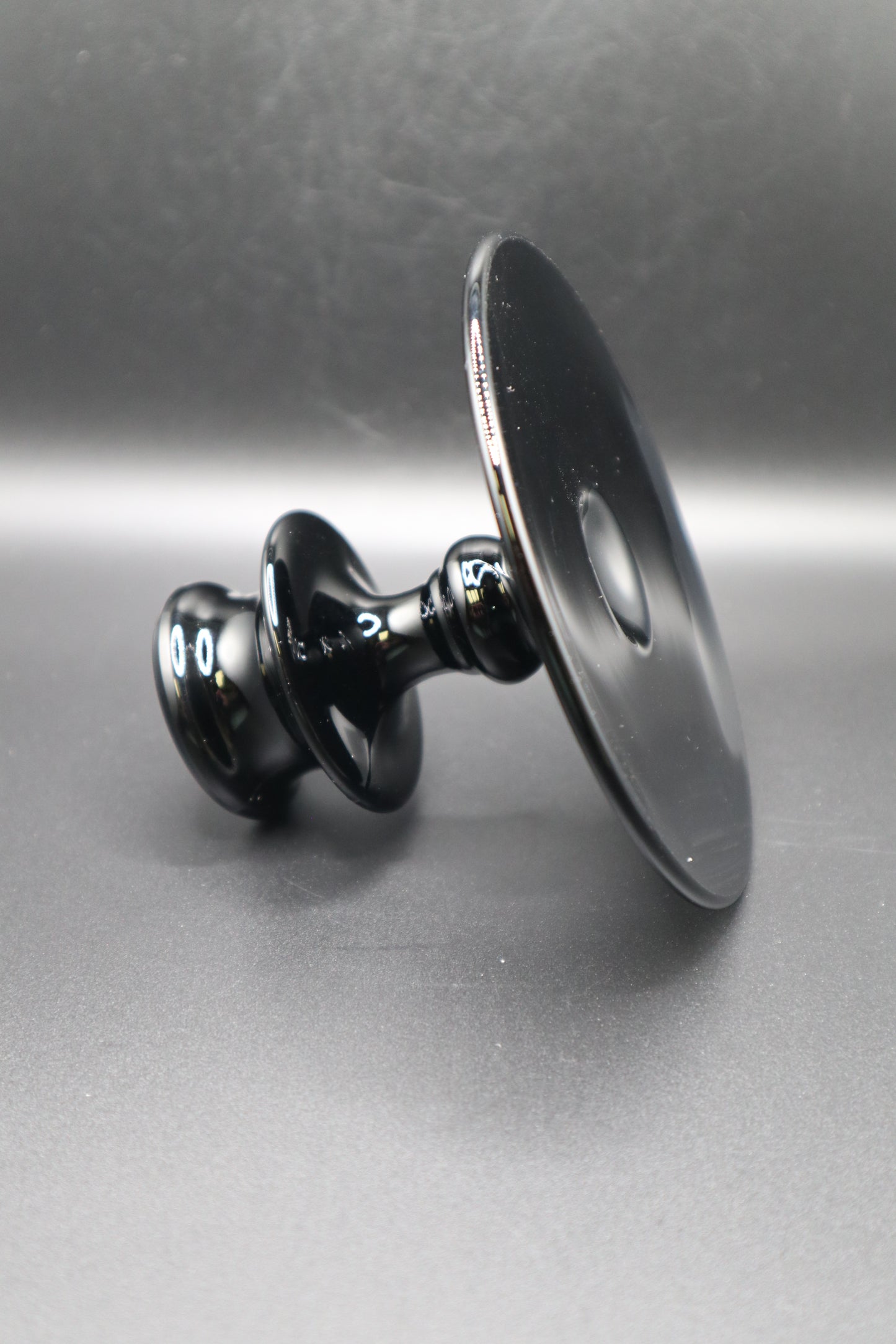 VINTAGE BLACK GLASS CANDLESTICK HOLDER