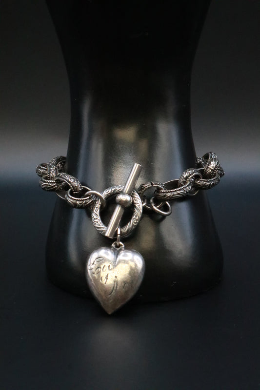 SILVER TONE BRACELET WITH ANTIQUE .999 SILVER SOLID PUFF HEART