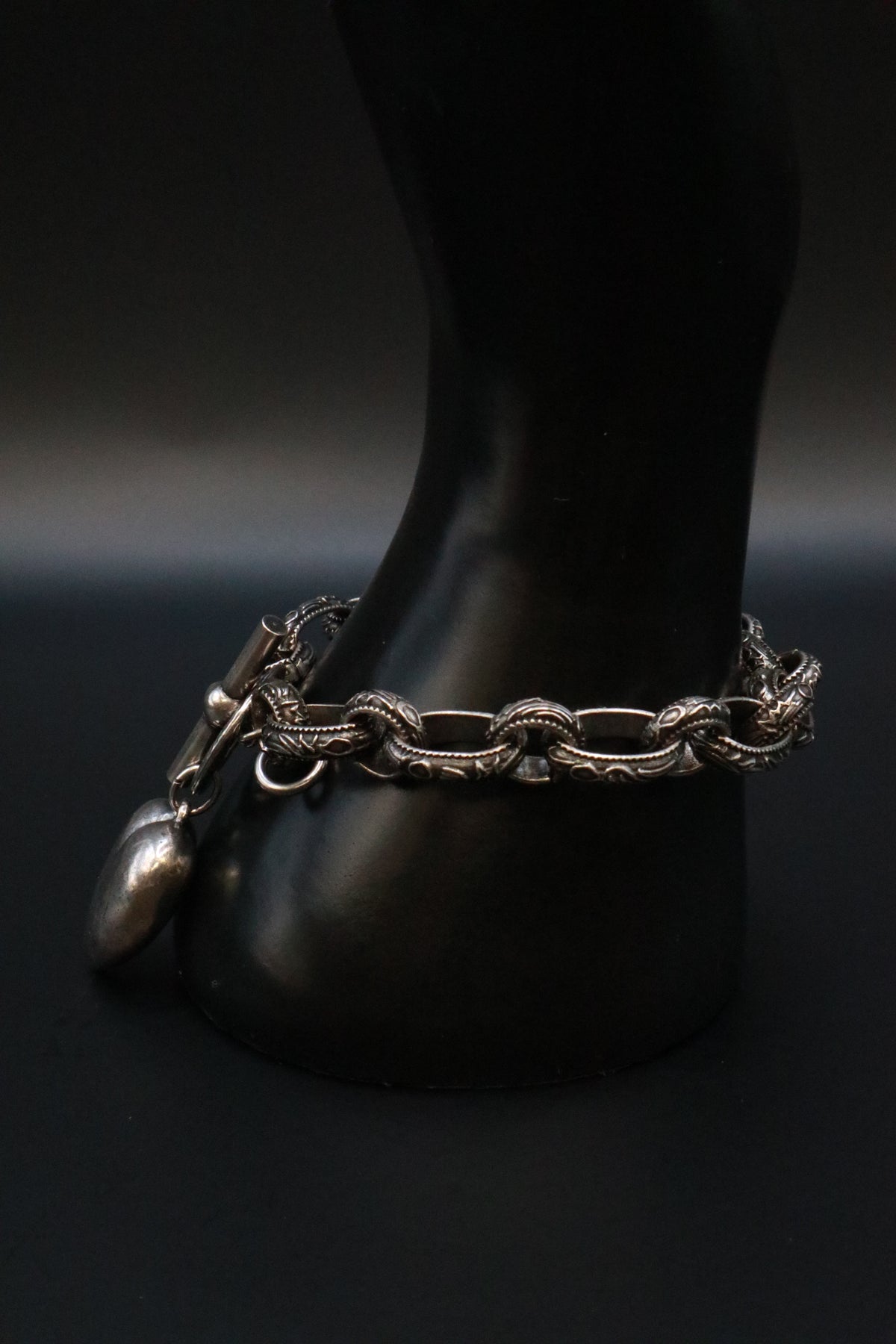 SILVER TONE BRACELET WITH ANTIQUE .999 SILVER SOLID PUFF HEART