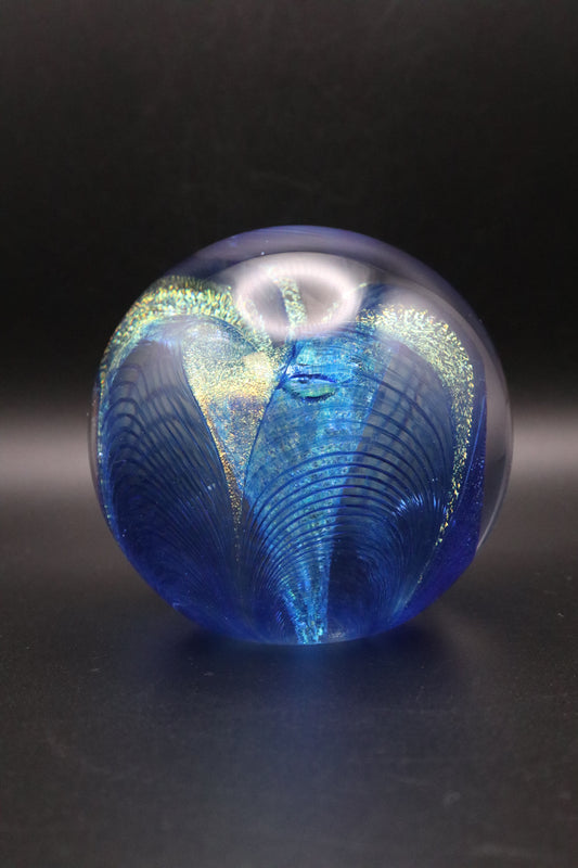 GLASS EYE STUDIO HAND BLOWN METALLIC BLUE WITH GOLD FLOWER PAPERWEIGHT