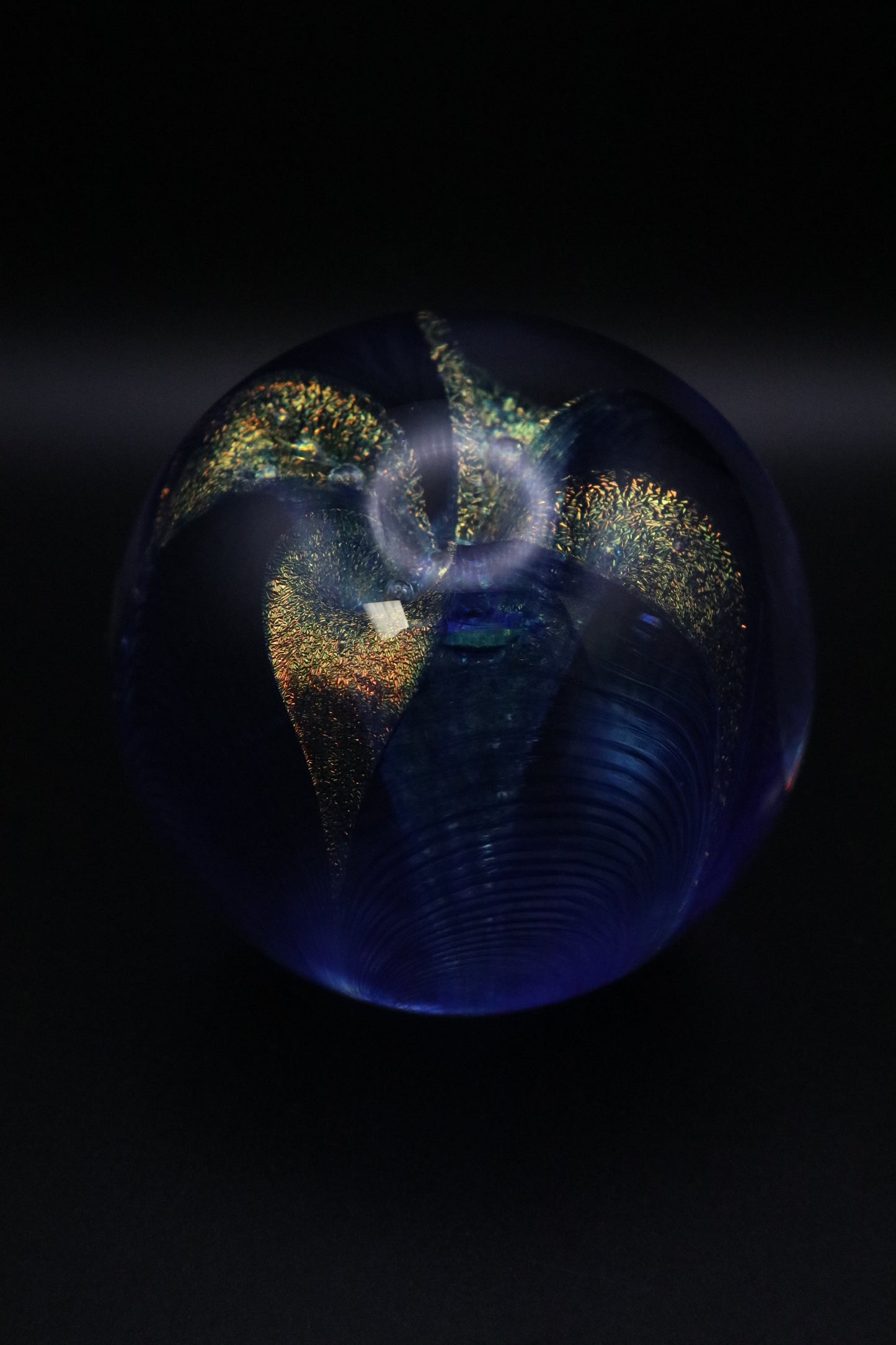 GLASS EYE STUDIO HAND BLOWN METALLIC BLUE WITH GOLD FLOWER PAPERWEIGHT