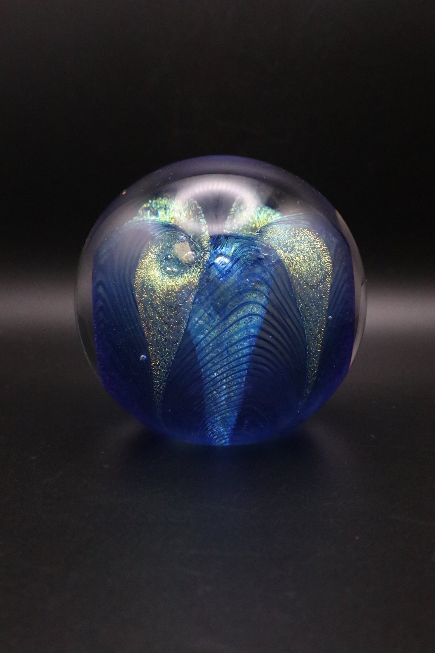 GLASS EYE STUDIO HAND BLOWN METALLIC BLUE WITH GOLD FLOWER PAPERWEIGHT